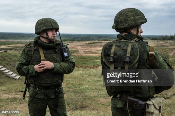 Belarusian soldiers watching the Zapad 2017 military exercises at the Asipovichy military training ground on September 18, 2017 in in Asipovichy,...