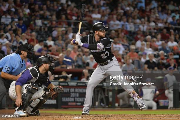 Trevor Story of the Colorado Rockies stands at bat in the MLB game against the against the Arizona Diamondbacks at Chase Field on September 14, 2017...