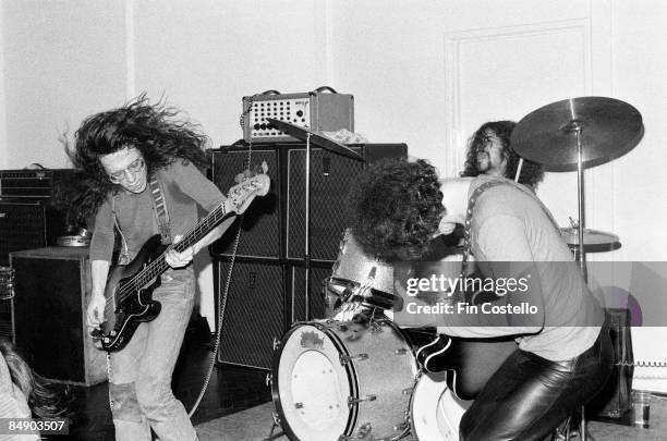 Photo of BUDGIE and Burke SHELLEY and Ray PHILLIPS and Tony BOURGE, L-R Burke Shelley, Ray Phillips and Tony Bourge performing on stage