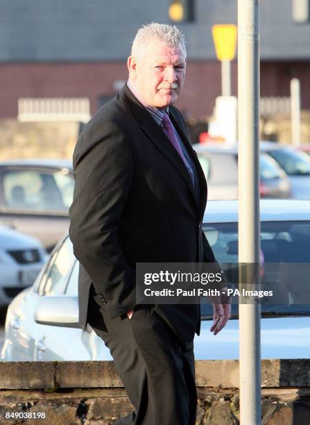 Former Ireland Rugby international David Tweed arrives at Antrim crown court.