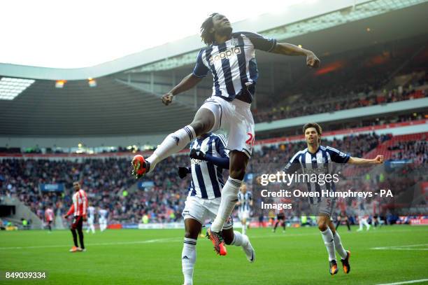 West Brom's Romelu Lukaku celebrates scoring his sides third goal from the penalty spot during the Barclays Premier League match at the Stadium of...