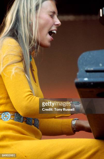 Canadian-American singer-songwriter Joni Mitchell performing on stage at the Isle of Wight Festival, Afton Down, Isle of Wight, 29th August 1970.