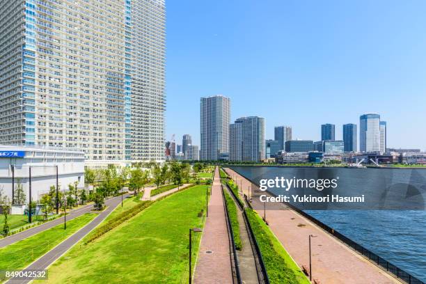 cityscape of harumi, tokyo - toyosu stock pictures, royalty-free photos & images