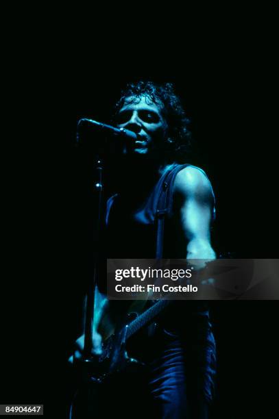 Photo of Bruce SPRINGSTEEN; Bruce Springsteen performing on stage - Chicken Scratch tour at the Civic Center