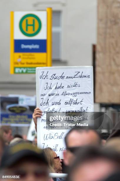 People attend a campain of german chancellor Angela Merkel on September 18, 2017 in Regensburg, Germany.