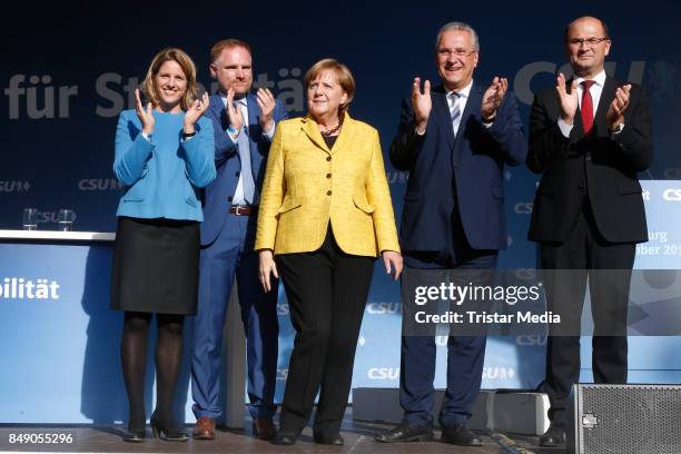 Astrid Freudenstein, Peter Aumer, German chancellor Angela Merkel, Joachim Herrmann and Albert Fueracker campain on September 18, 2017 in Regensburg,...