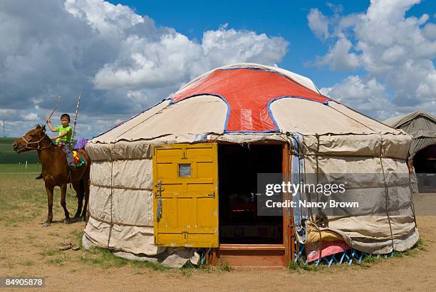 inner mongolian boy riding a horse outside of  his - xilinhot stock pictures, royalty-free photos & images