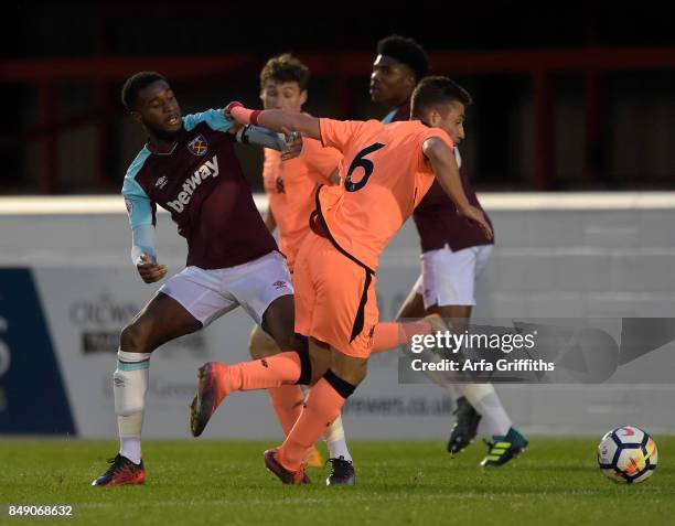 Cameron Brannagan of Liverpool in action with Moses Makasi of West Ham United during the Premier League 2 match between West Ham United and Liverpool...