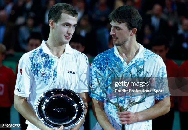 Winner Goran Ivanisevic of Croatia and runner-up Andriy Medvedev of the Ukraine with their trophies after the men's singles final during the Bercy...