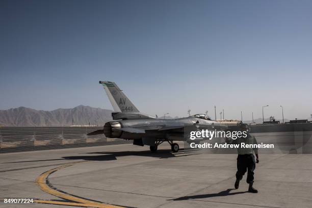 An American F-16 fighter jet taxis down a runway at Bagram Air Field on September 5, 2017 in Bagram, Afghanistan. Currently the United States has...