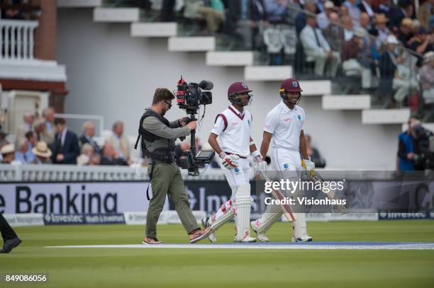 Steadicam" cameraman working for Sky Sports as Kraigg Brathwaite and Kieran Powell of the West Indies walk out to bat during Day One of the 3rd...