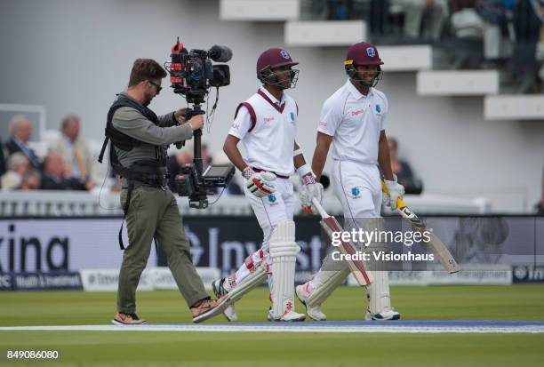 Steadicam" cameraman working for Sky Sports as Kraigg Brathwaite and Kieran Powell of the West Indies walk out to bat during Day One of the 3rd...