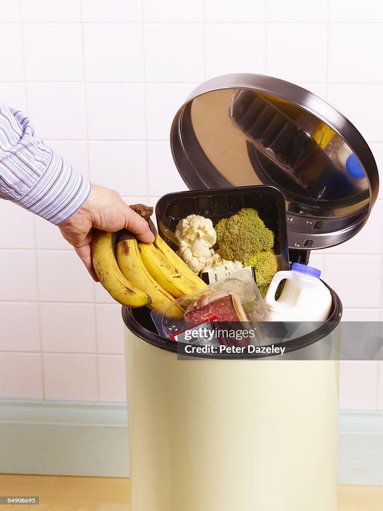 Out of date food in garbage bin.