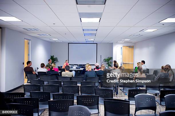 people in spare meeting/training room - sports training stock pictures, royalty-free photos & images