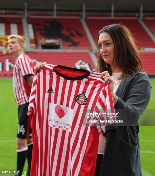 Gemma Lowery displaying the Bradley Lowery Foundation shirts to worn in the up coming Carabao cup match on September 18, 2017 in Sunderland, England.