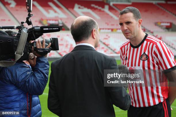 John O'Shea of Sunderland AFC displaying the Bradley Lowery Foundation shirts to worn in the up coming Carabao cup match on September 18, 2017 in...