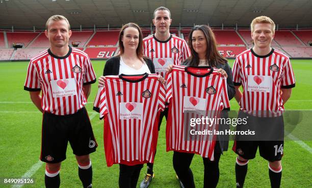 Gemma Lowery and and Lynn Murphy join Lee Cattermole, John O'Shea and Duncan Watmore displaying the Bradley Lowery Foundation shirts to worn in the...