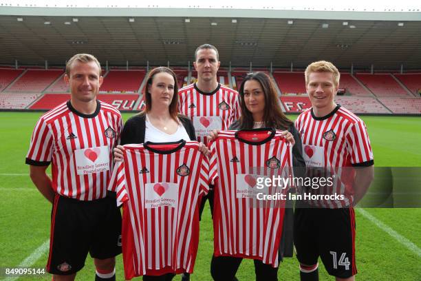 Gemma Lowery and Lynn Murphy join Lee Cattermole, John O'Shea and Duncan Watmore displaying the Bradley Lowery Foundation shirts to worn in the up...