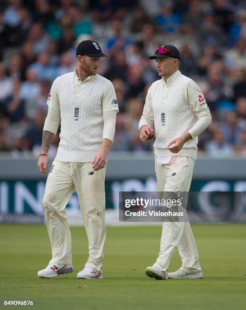 Ben Stokes and Joe Root of England during Day One of the 3rd Investec Test Match between England and West Indies at Lord's Cricket Ground on...