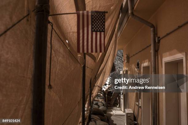 Marine keeps watch from his post at Camp Bost on September 11, 2017 in Helmand Province, Afghanistan. About 300 marines are currently deployed in...