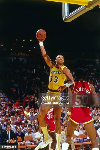 Kareem Abdul-Jabbar of the Los Angeles Lakers shoots against the Houston Rockets circa 1983 at the Great Western Forum in Inglewood, California. NOTE...