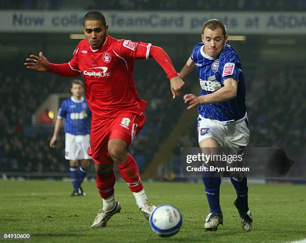 Lewis McGugan of Nottingham Forest battles with Alan Quinn of Ipswich Town during the Coca Cola Championship match between Ipswich Town and...