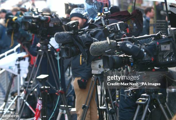 The waiting media await the arrival of the Duke of Cambridge at the King Edward VII hospital in London to visit his wife, the Duchess of Cambridge...