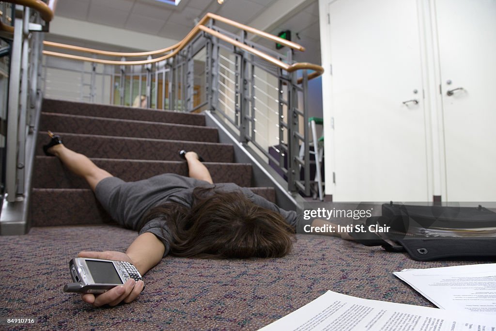 Fall While Using Phone Business Woman Fallen Down Stairs Saving Phone High-Res Stock Photo ...
