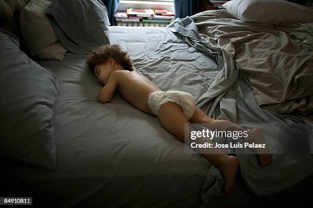 toddler boy sleeping  - diaper kids stock pictures, royalty-free photos & images