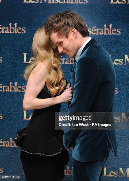 Amanda Seyfried and Eddie Redmayne arrives at the premiere of Les Miserables at the Empire Leicester Square, London, UK