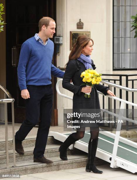 The Duke and Duchess of Cambridge leave the King Edward VII hospital in London where the Duchess of Cambridge had been admitted with severe morning...