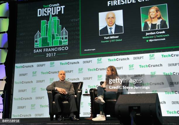 Founder of DST Global Yuri Milner and TechCrunch moderator Jordan Crook speak onstage during TechCrunch Disrupt SF 2017 at Pier 48 on September 18,...