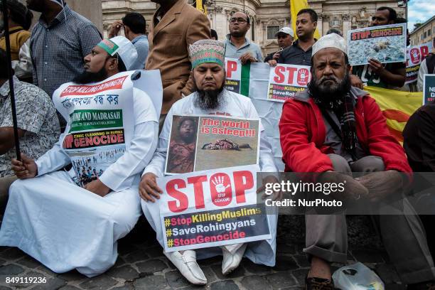 Hundreds of Muslims took to the streets to denounce Myanmars &quot;genocide&quot; against the Rohingya Muslim ethnic minority in Rome, Italy on...