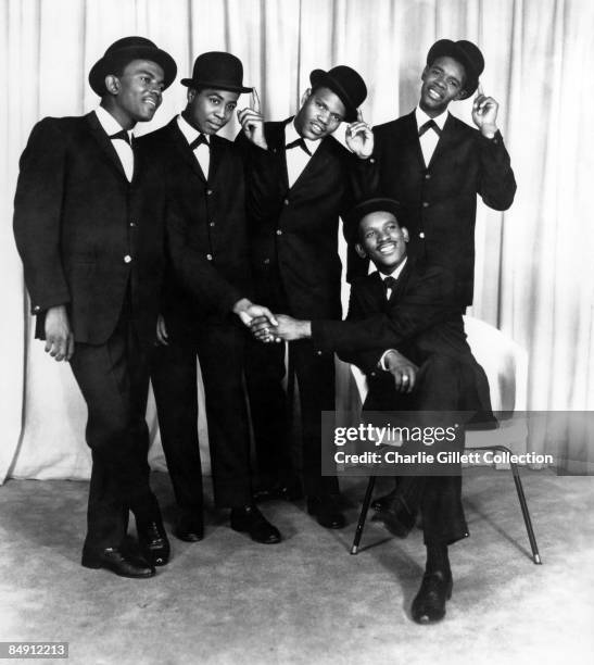 Photo of Harold MELVIN & The Blue Notes; studio posed,