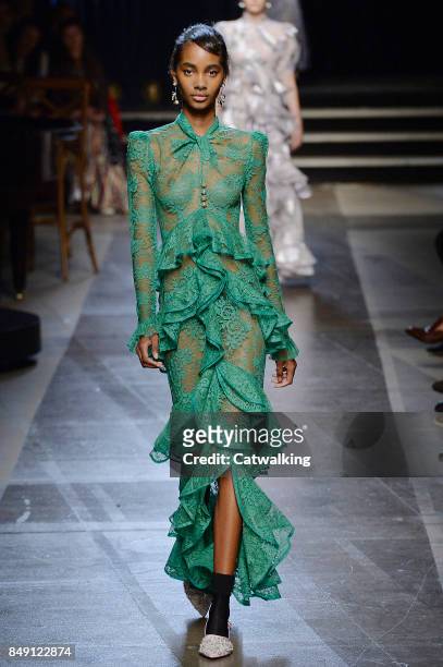 Model walks the runway at the Erdem Spring Summer 2018 fashion show during London Fashion Week on September 18, 2017 in London, United Kingdom.