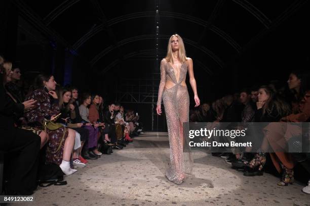 Model walks the runway during the Julien Macdonald Spring Summer 2018 Show sponsored by Ciroc at The Bankside Vaults on September 18, 2017 in London,...