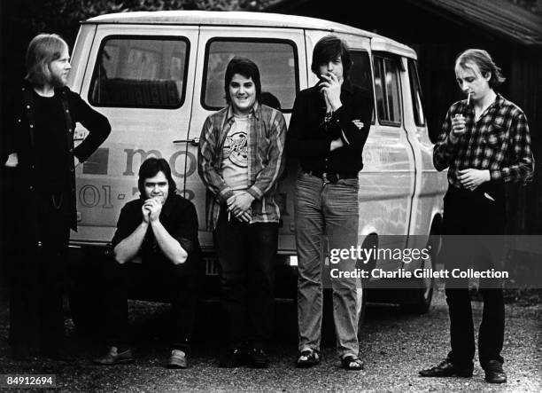 Photo of BRINSLEY SCHWARZ; posed with transit van, Nick Lowe smoking second right