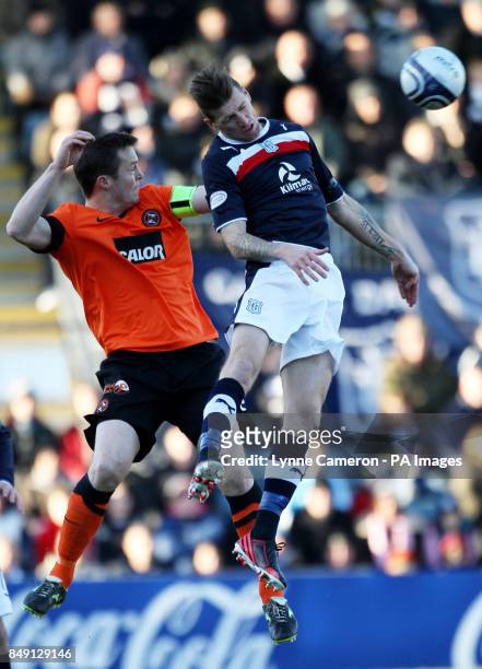 Dundee United's Jon Daloy and Dundee's Iain Davidson jump for the ball during the Clydesdale Bank Scottish Premier League match at Dens Park, Dundee.