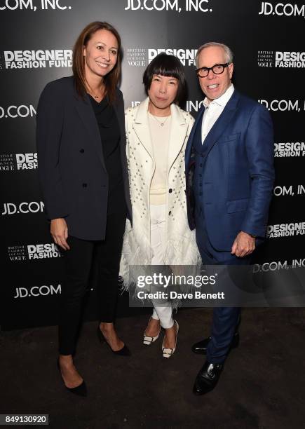 Caroline Rush, Angelica Cheung and Tommy Hilfiger attend the BFC Vogue Fashion Fund and JD.COM cocktail party hosted by Caroline Rush and Xia Ding at...