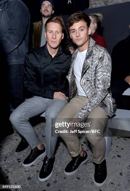 Dustin Lance Black and Tom Daley attend the Julien Macdonald show during London Fashion Week September 2017 on September 18, 2017 in London, England.