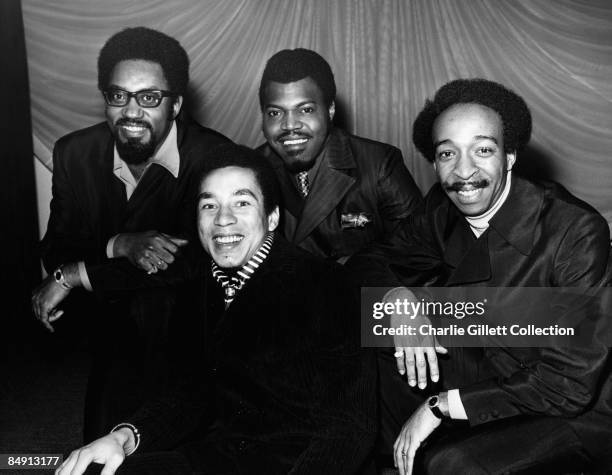 Photo of Ronald WHITE and Smokey ROBINSON and Bobby ROGERS and MIRACLES and Pete MOORE; Posed group portrait with The Miracles L-R Bobby Rogers,...