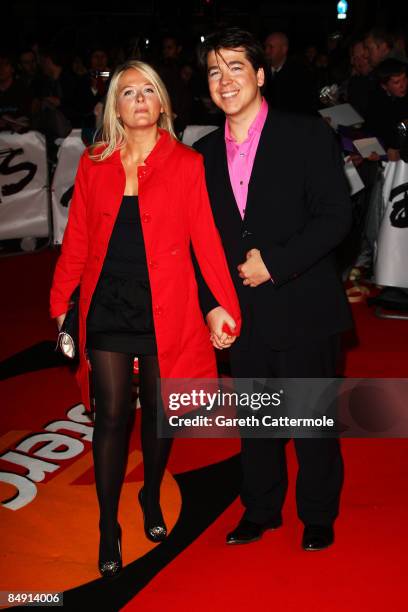 Comedian Michael McIntyre and wife Kitty arrive at the Brit Awards 2009 at Earls Court on February 18, 2009 in London, England.