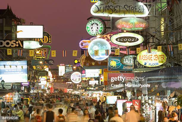 crowded street at night - khao san road stock pictures, royalty-free photos & images