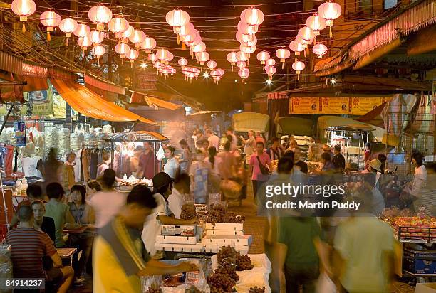 night market in bangkok's china town - chinese lantern festival stock-fotos und bilder