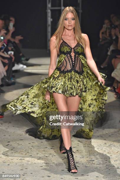 Model walks the runway at the Julien Macdonald Spring Summer 2018 fashion show during London Fashion Week on September 18, 2017 in London, United...