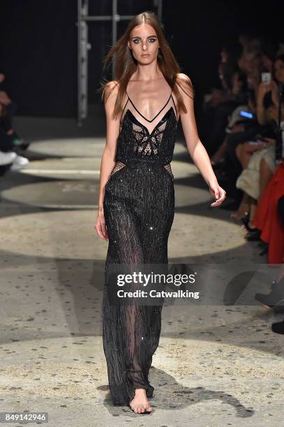 Model walks the runway at the Julien Macdonald Spring Summer 2018 fashion show during London Fashion Week on September 18, 2017 in London, United...