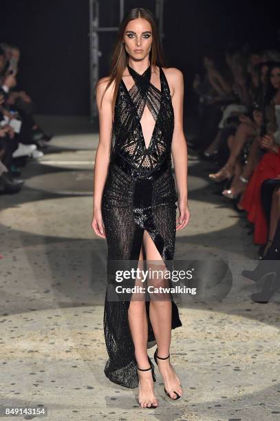 Model walks the runway at the Julien Macdonald Spring Summer 2018 fashion show during London Fashion Week on September 18, 2017 in London, United...