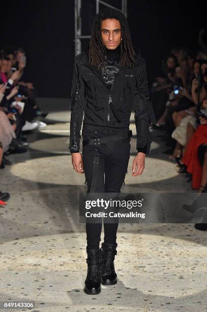 Model walks the runway at the Julien Macdonald Spring Summer 2018 fashion show during London Fashion Week on September 18, 2017 in London, United...