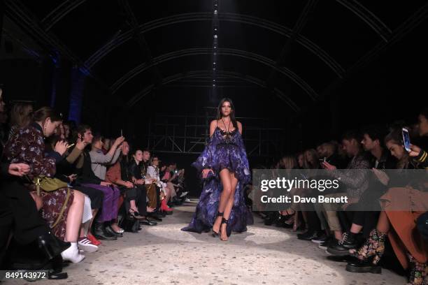Model walks the runway during the Julien Macdonald Spring Summer 2018 Show sponsored by Ciroc at The Bankside Vaults on September 18, 2017 in London,...