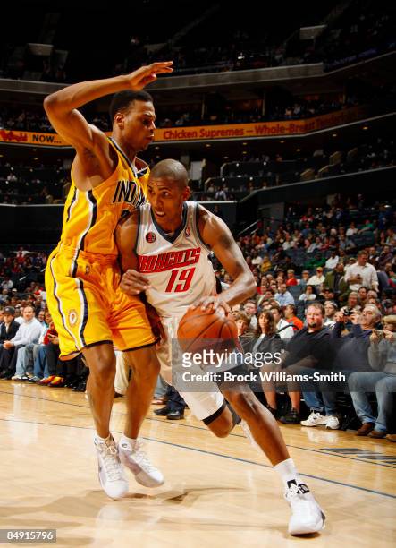 Brandon Rush of the Indiana Pacers guards against Raja Bell of the Charlotte Bobcats on February 18, 2009 at the Time Warner Cable Arena in...